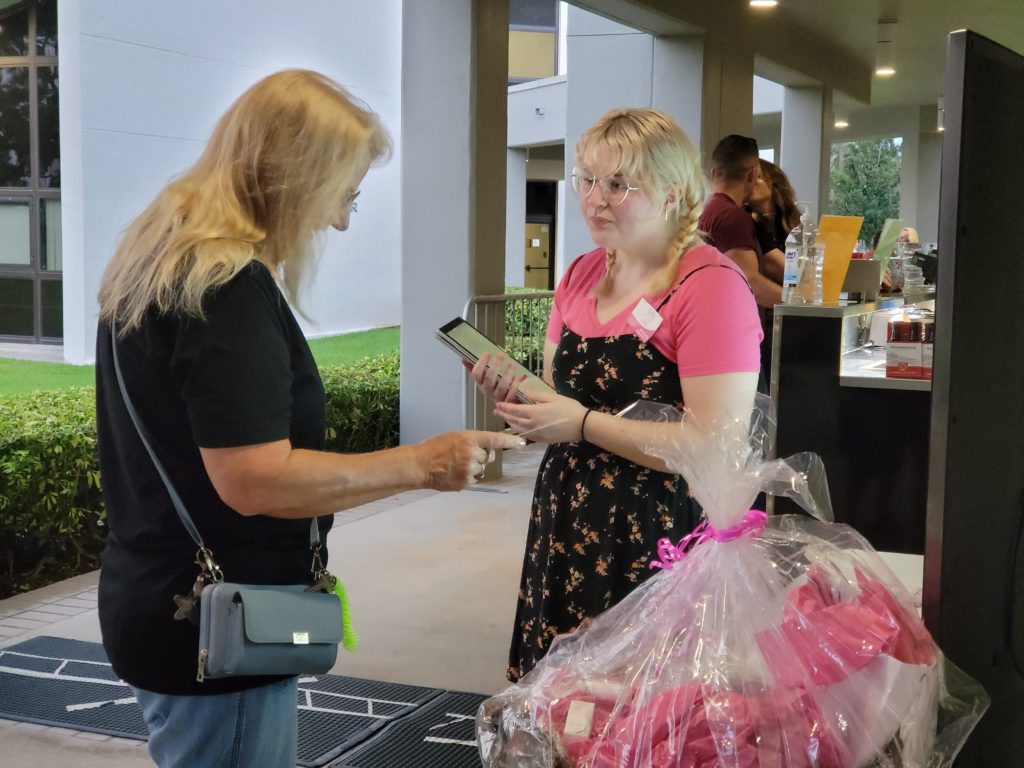 Olivia Magee at King Center booth.